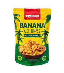 A stand-up pouch of S. Motiram Banana Chips Classic Salted, featuring a bright yellow and green tropical design with a bowl of banana chips on the front.