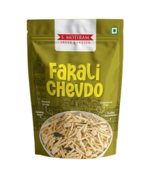 A stand-up pouch of S. Motiram Farali Chevdo (frozen fish crackers) in olive green packaging with yellow text and a photo of the crackers in a bowl at the bottom.