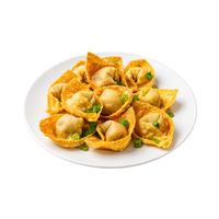 A plate of golden-brown fried wonton wrappers filled with dumplings and garnished with chopped green onions, served on a white plate against a white background.