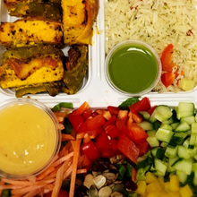 Load image into Gallery viewer, Grilled paneer garden salad with rice from Tiffin Stash - Veg Healthy Meals by India&#39;s Flavour featuring fresh vegetables and dressing.
