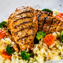 Load image into Gallery viewer, Grilled chicken breast with rice and steamed vegetables from Tiffin Stash - Non-Veg Healthy Meals by India&#39;s Flavour, ideal for gym-goers and clean eating.
