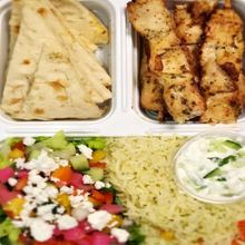 Load image into Gallery viewer, Souvlaki chicken with feta salad, tzatziki, and rice from Tiffin Stash - Non-Veg Healthy Meals by India&#39;s Flavour, a Greek-inspired healthy dinner option.
